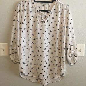 White blouse with bird